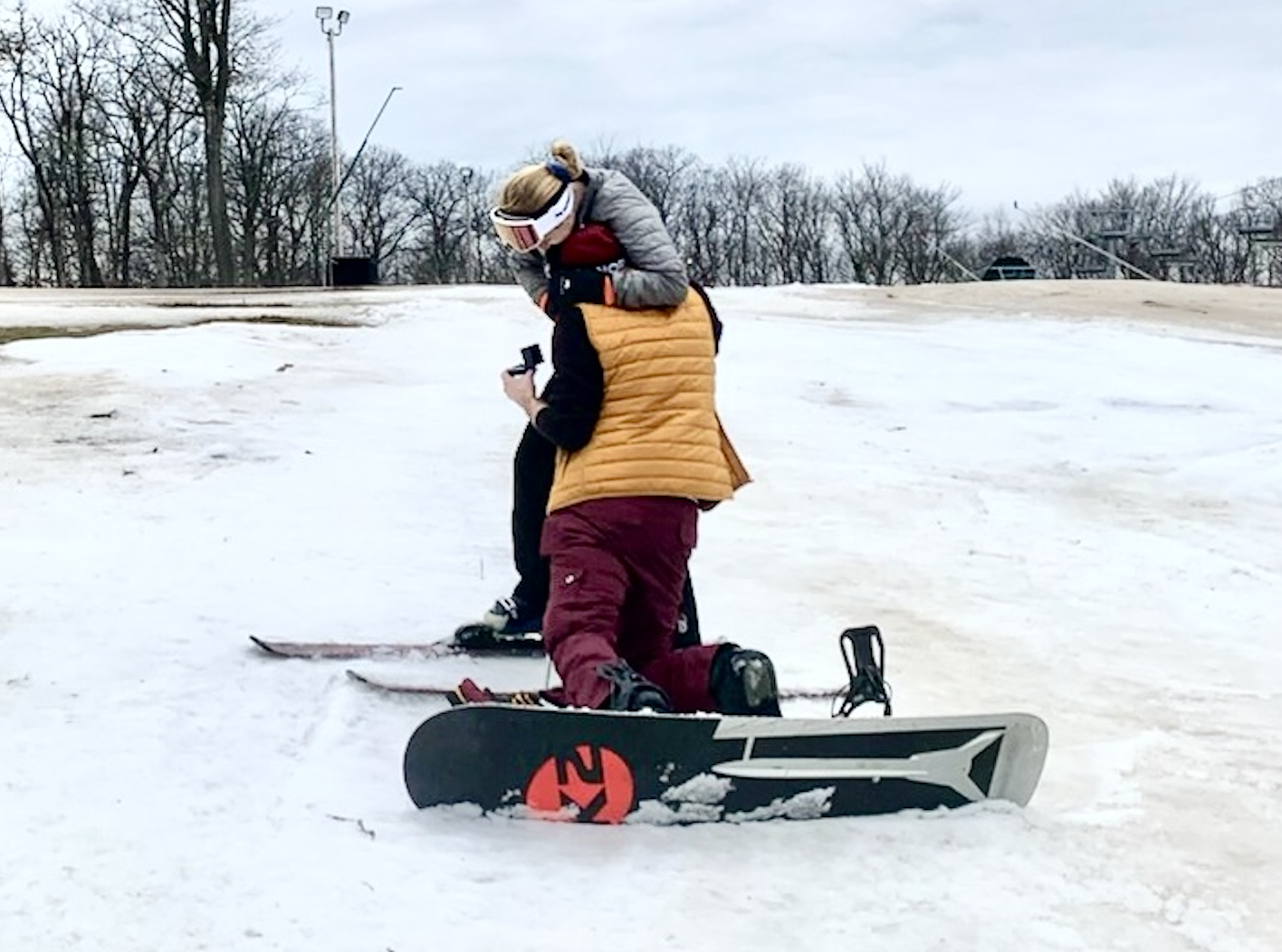 Lauren and Stephen during their proposal on the ski slope